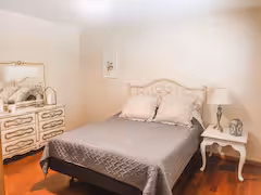 First floor bedroom with queen bed at Cave and Creek