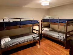 First floor bedroom with two bunk beds for kids