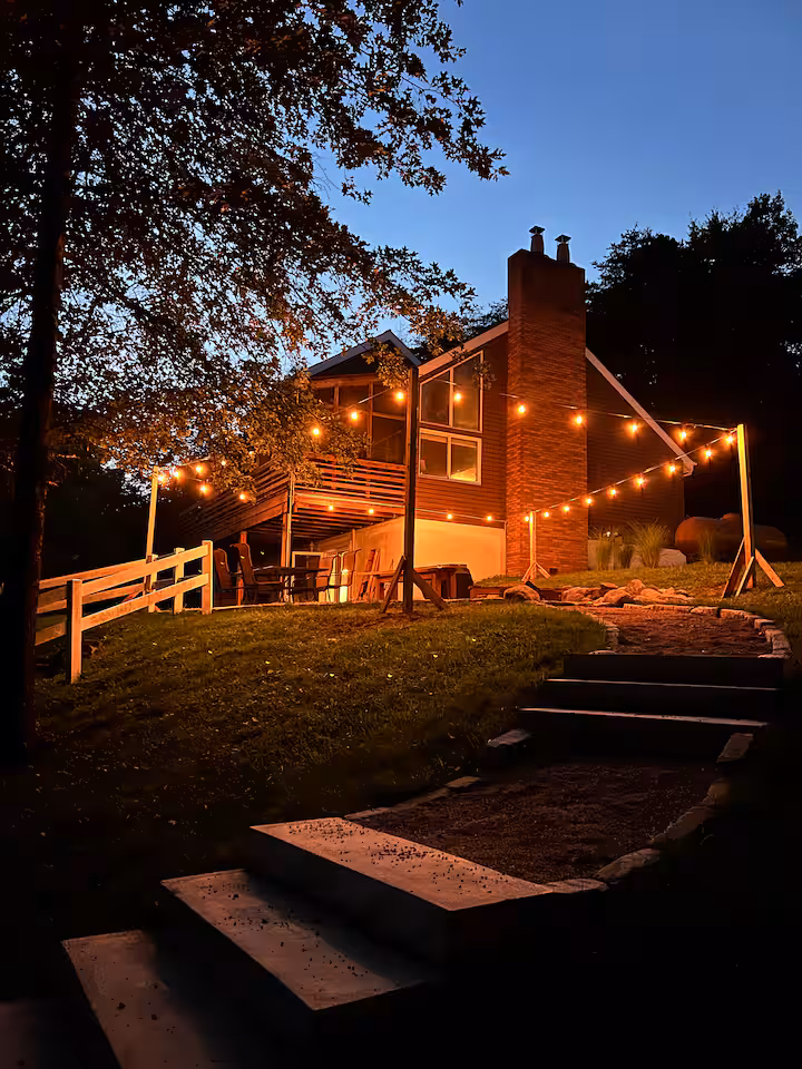 Fire pit area at Cave and Creek cabin at night