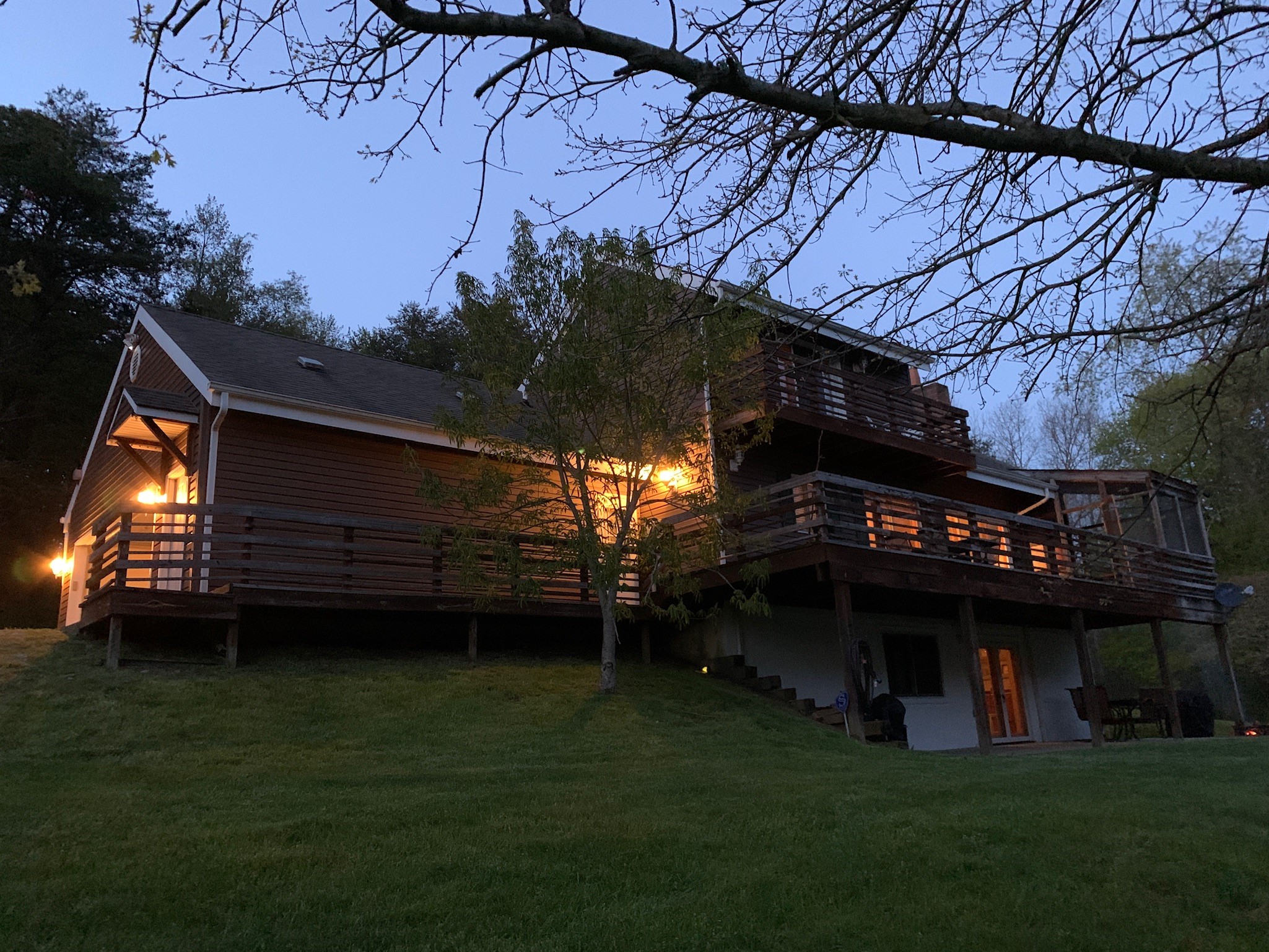Side view of Cave and Creek cabin at dusk